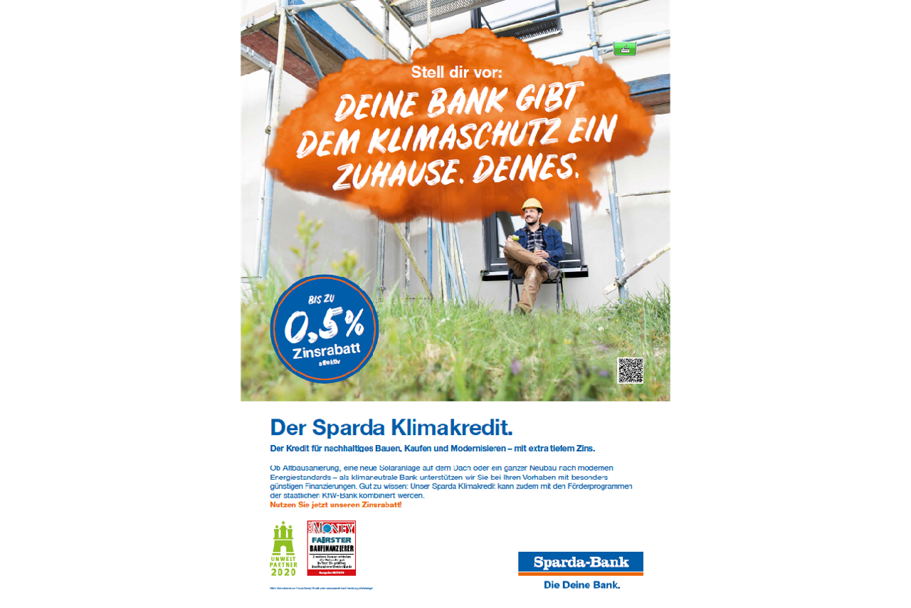 Mann in Arbeitskleidung vor Baustelle