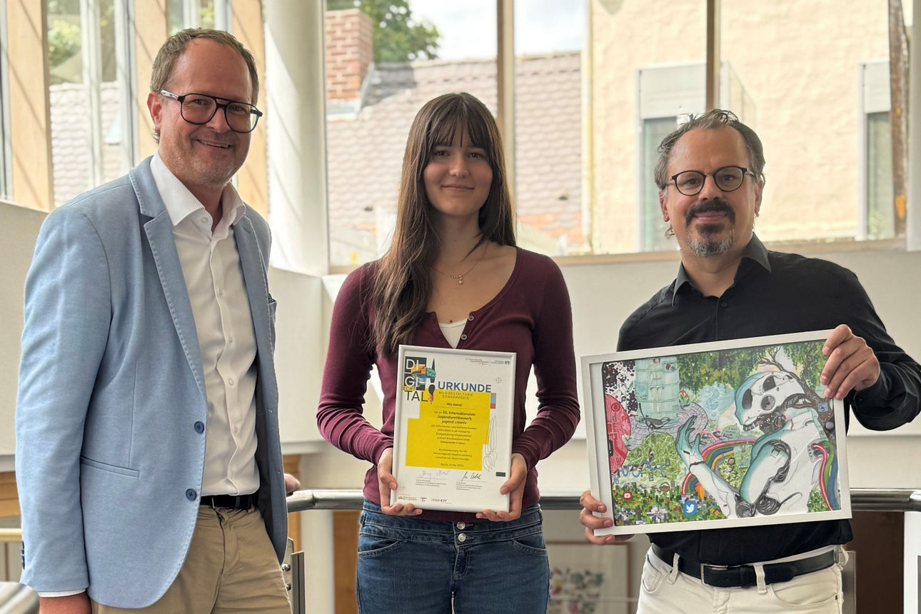 Alexander Schuster, Mia Hanel und Matthias Held bei der Preisübergabe
