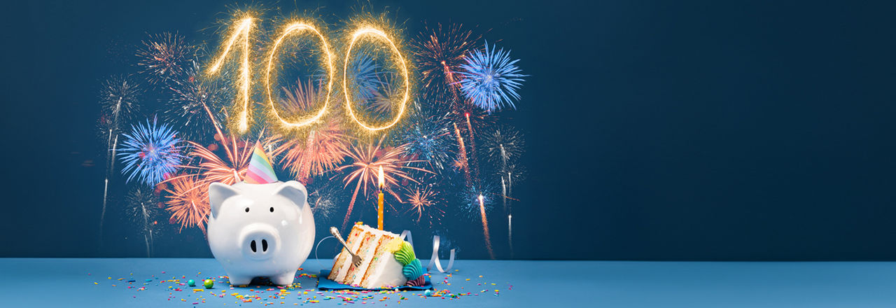 Grafik zur Feier des 100. Weltspartags mit Sparschweinchen und Feuerwerk