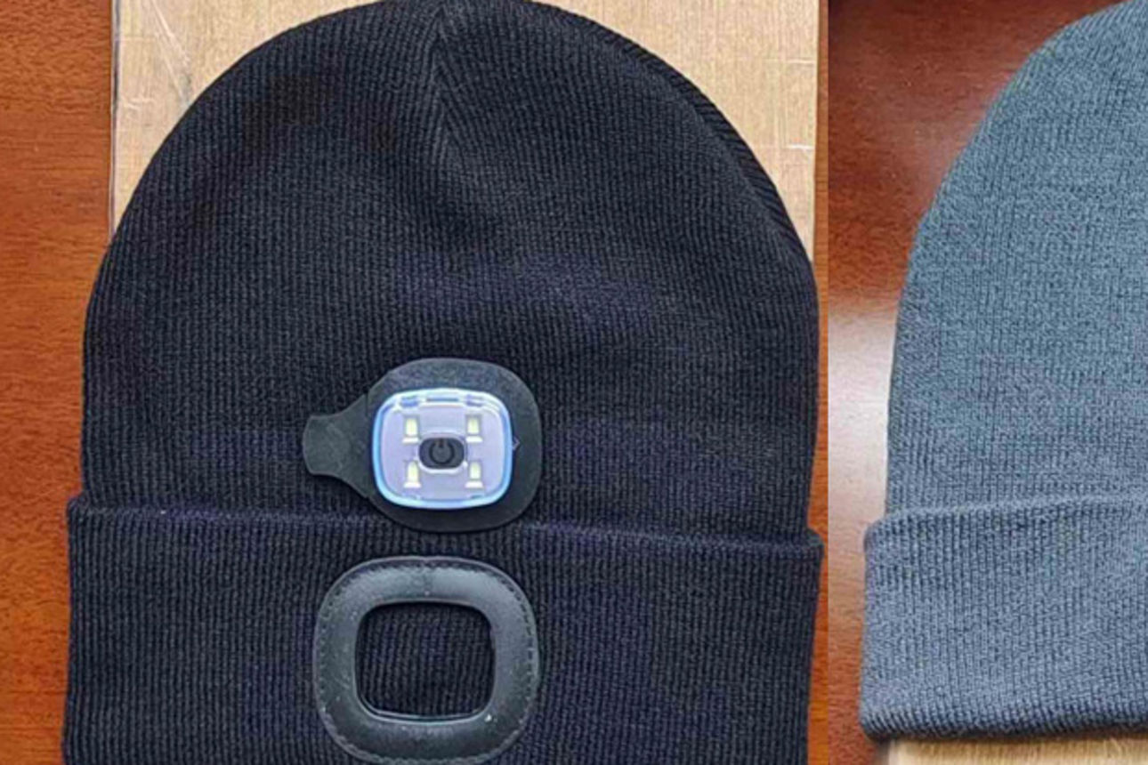 Zwei Hüte, ein schwarzer und ein grauer, mit integrierten abnehmbaren LED-Leuchten