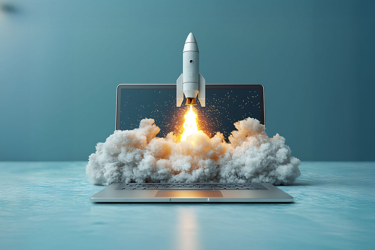 Rakete die vor einem Laptop startet