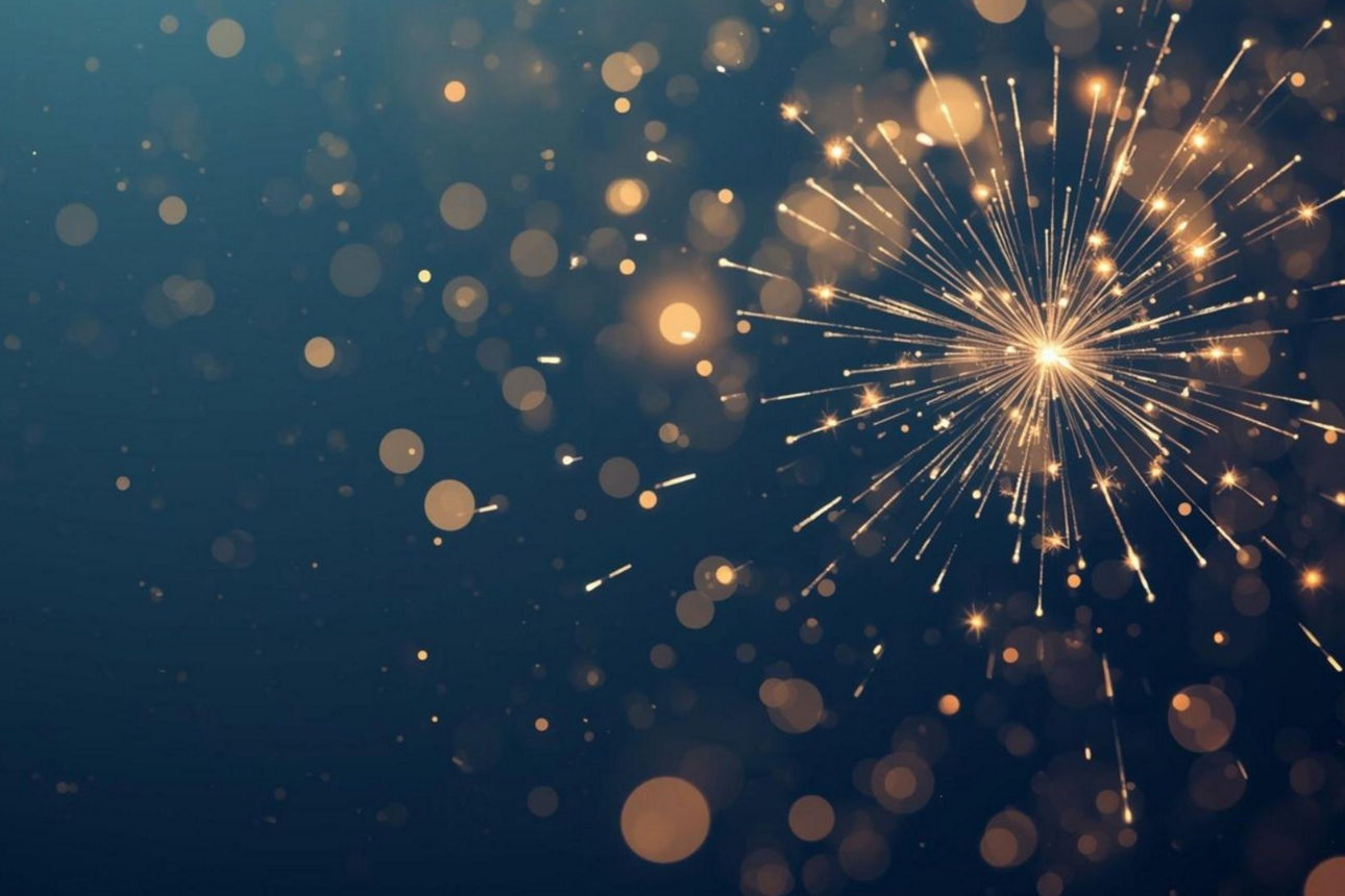 Goldene Lichtpunkte und ein strahlendes Feuerwerk auf dunklem Hintergrund erzeugen einen festlichen, funkelnden Effekt.