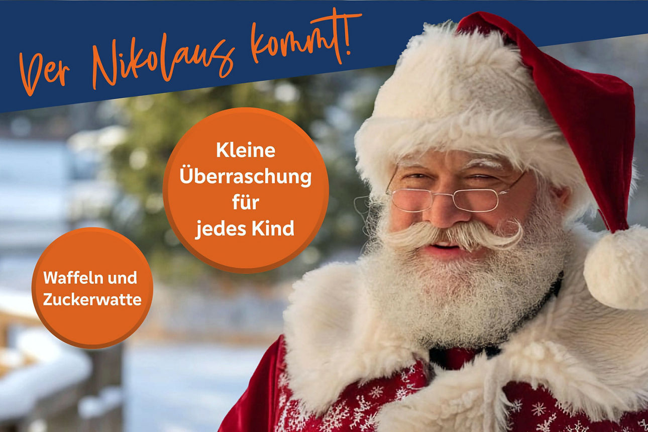Lächelnder Nikolaus mit roter Mütze und langem Bart