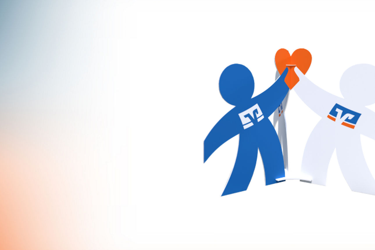 Zwei Männchen mit VR-Logo halten gemeinsam ein Herz in der Hand.