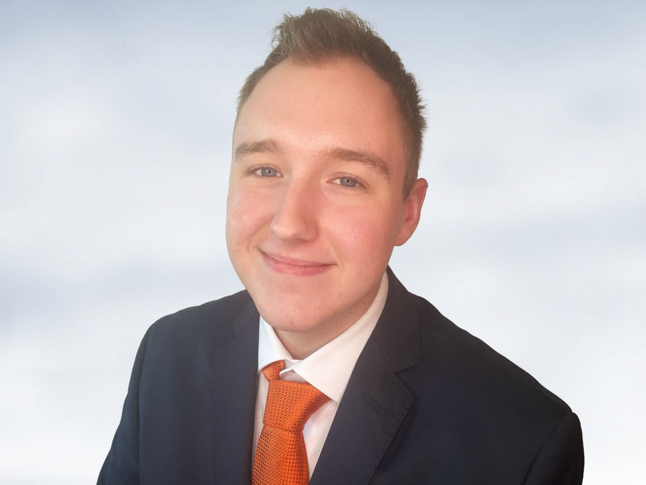 Portraitfoto eines Auszubildenden der Brandenburger Bank