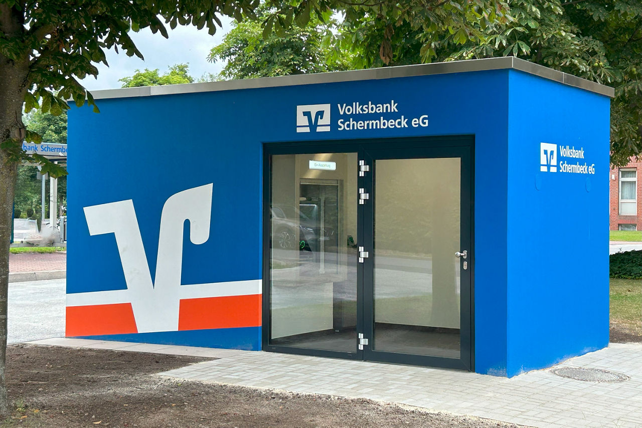 Blauer SB-Pavillon mit doppelter Glastür.