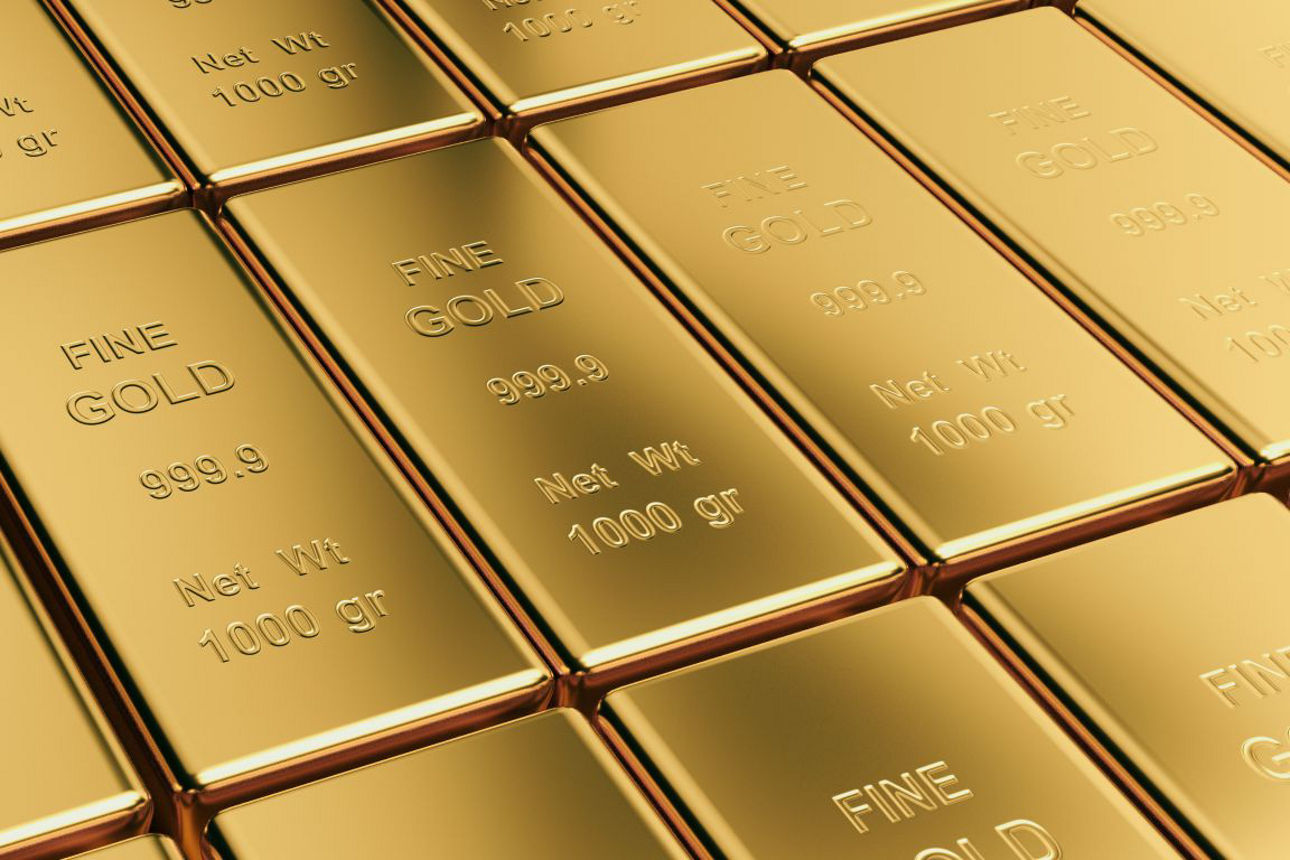 Das Bild zeigt mehrere Goldbarren. 
