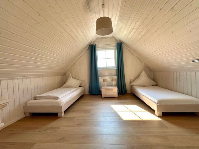 Schlafzimmer (Obergeschoss) im Ferienhaus