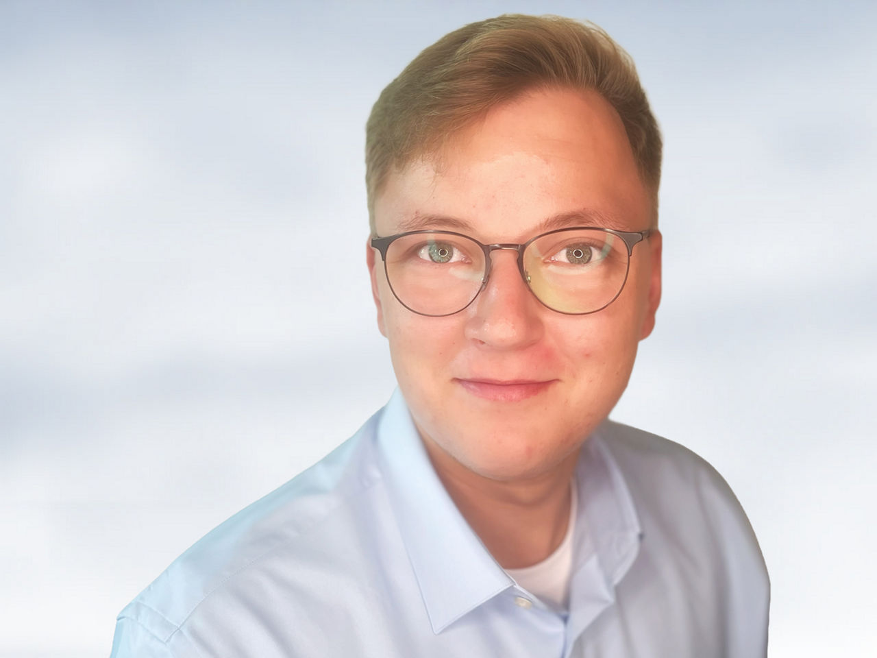 Portraitfoto eines Auszubildenden der Brandenburger Bank