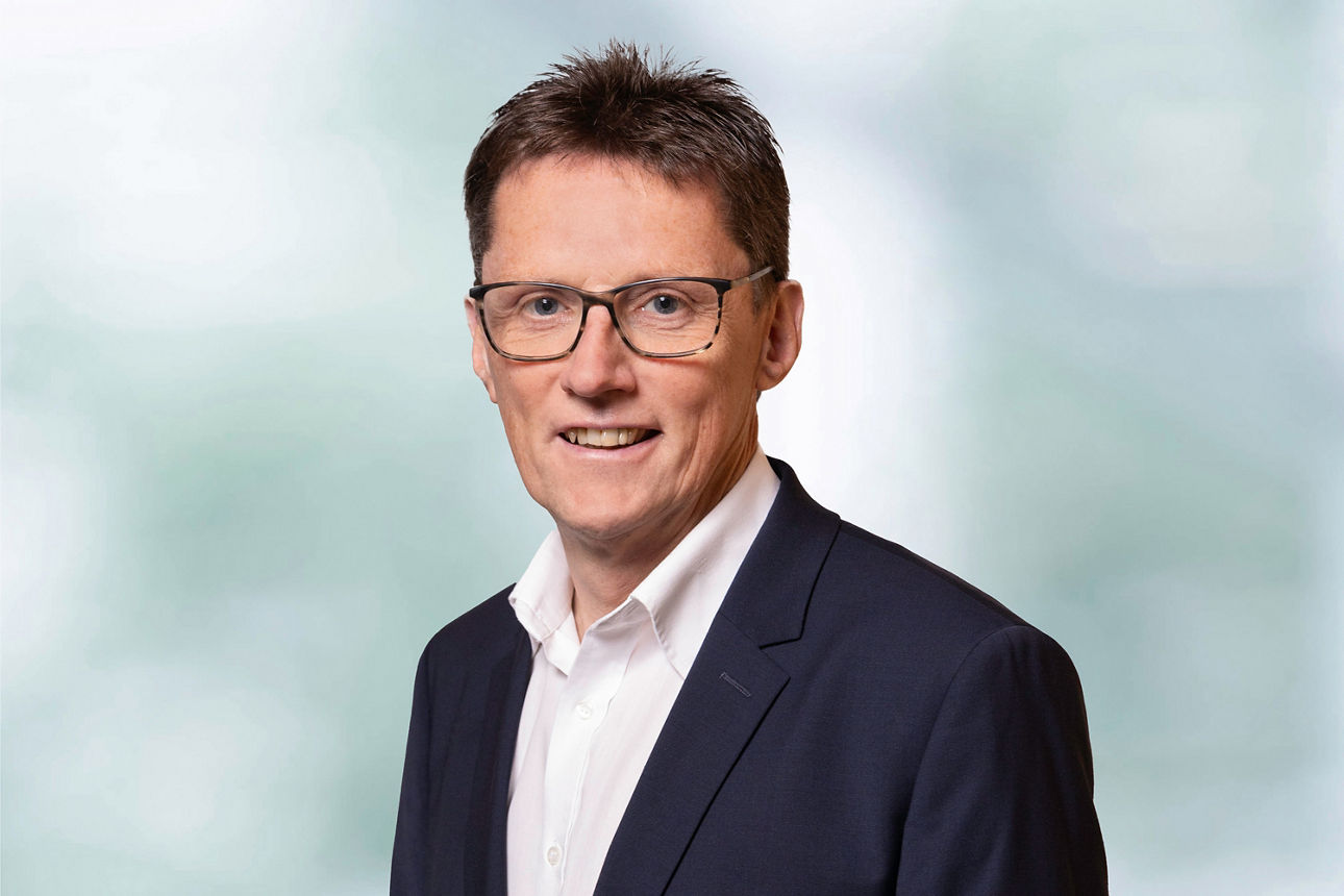 Portraitaufnahme unseres Kollegen Dirk Simon