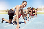 5 Frauen in Startposition bei einem Lauf