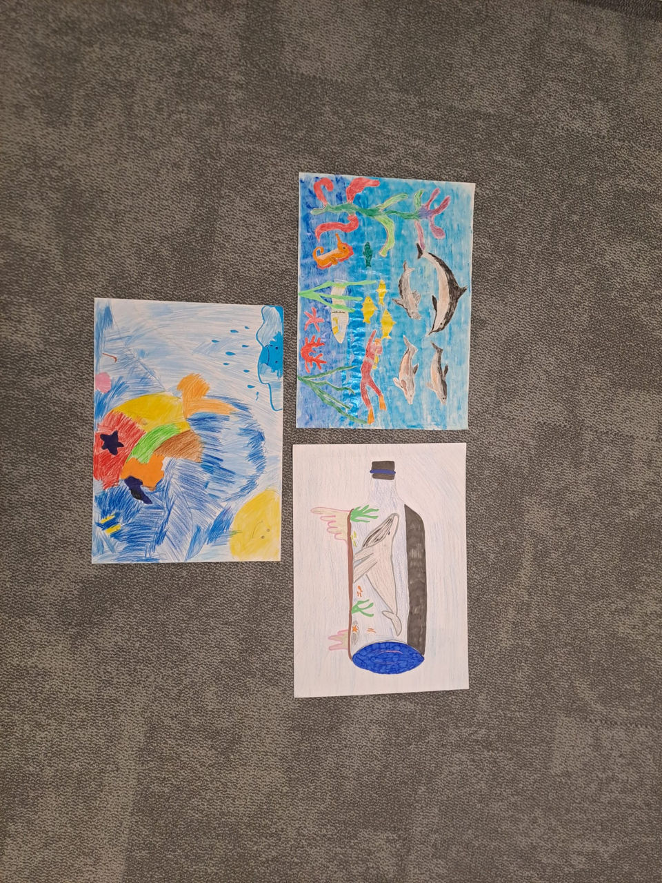 3 gemalte Bilder von Kindern aus der Sparte Inklusion