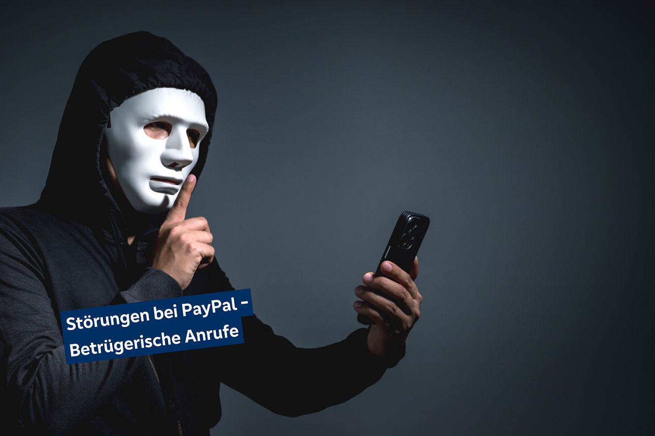 Mensch mit Maske legt Finger vor und hat Handy in der Hand