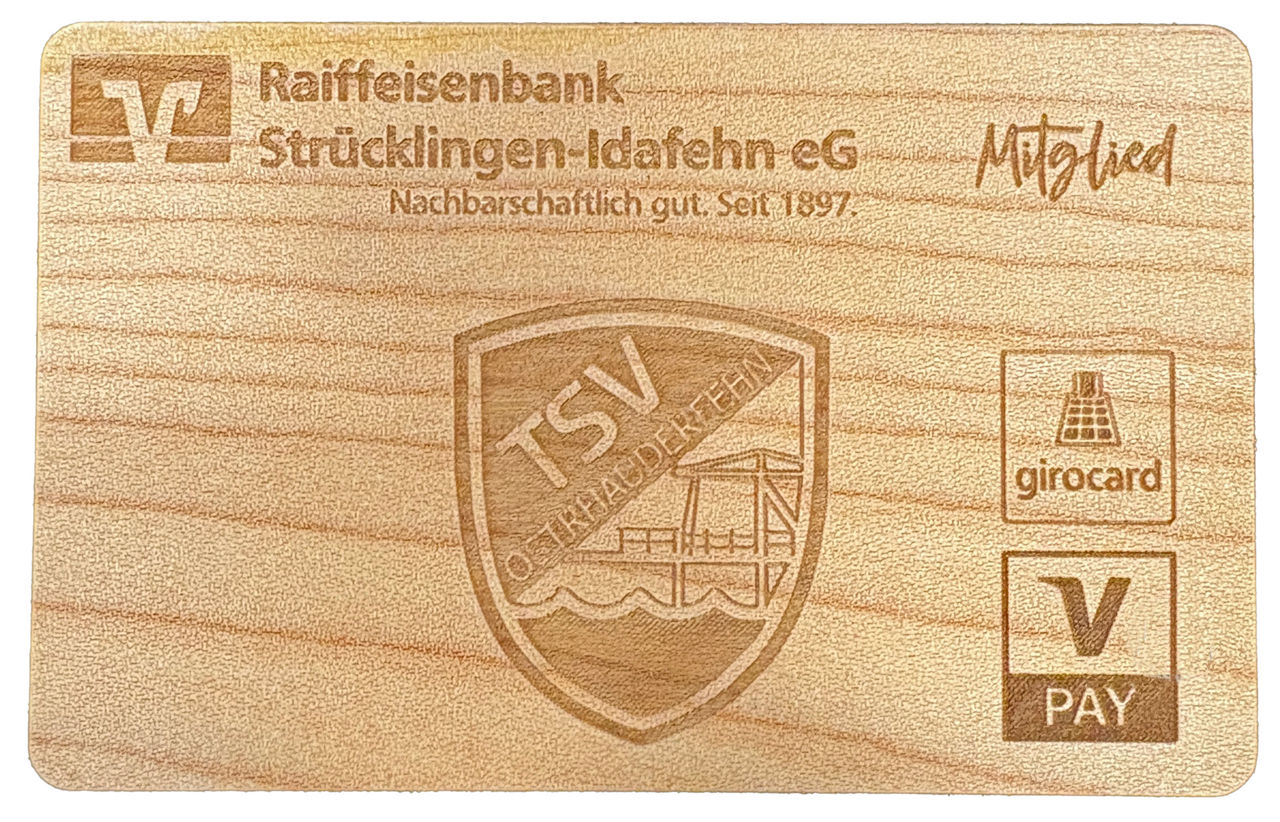 Holzkarte mit dem Logo der Raiba und dem Vereinslogo des TSV Ostrhauderfehn