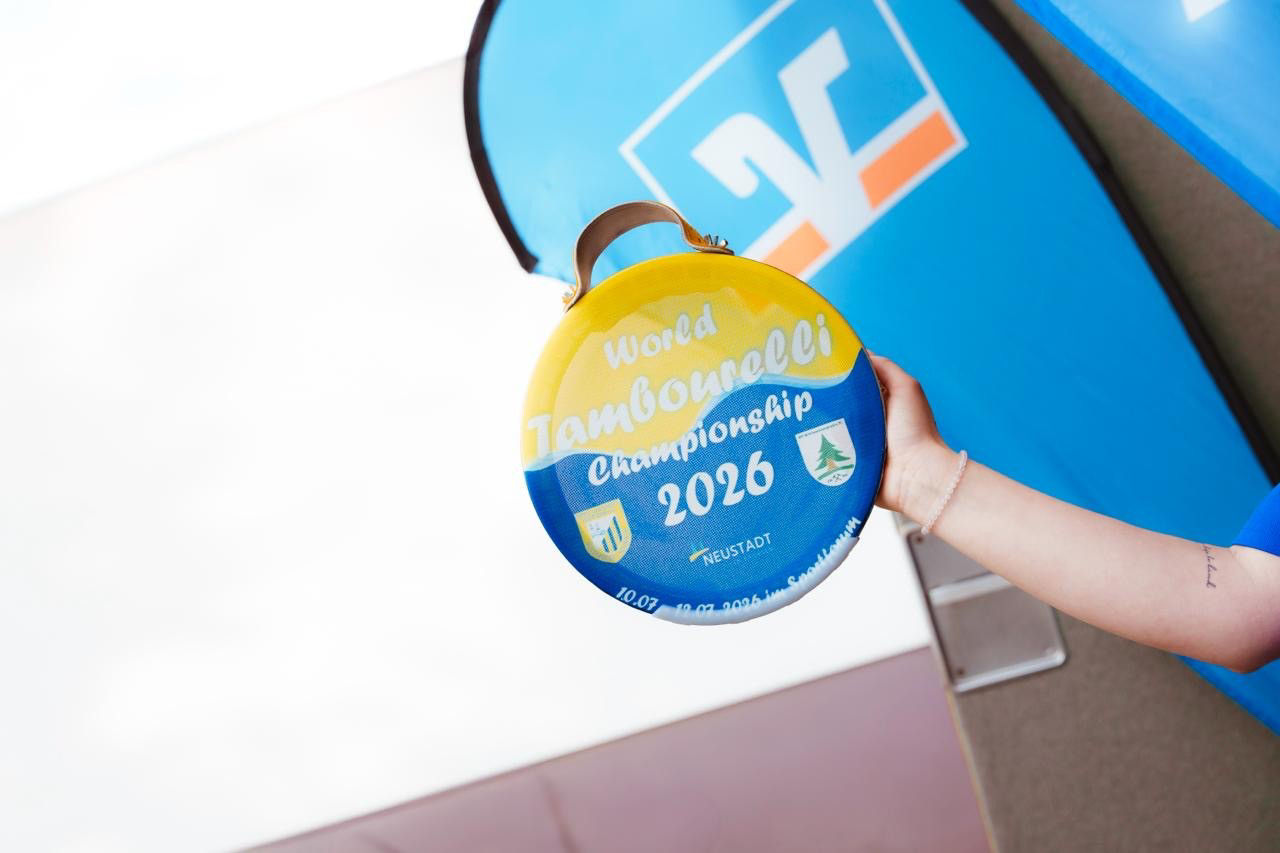 Tambourelli‑Schläger zur World Tambourelli Championship 2026 mit Veranstaltungsort Neustadt und Termin im Juli 2026.