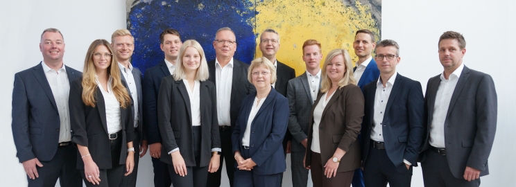 Teamfoto mit den Mitarbeitern des Vermögensmanagements