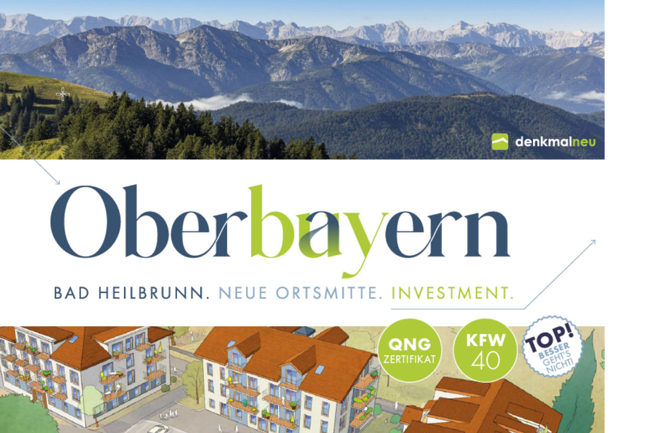 Ein Expose-Titelblatt mit einem Panoramabild einer Berglandschaft im oberen Bereich. Darunter steht groß "Oberbayern" und "BAD HEILBRUNN. NEUE ORTSMITTE. INVESTMENT.". Im unteren Bereich ist eine illustrierte Ansicht mehrerer Häuser mit Parkplätzen zu sehen. Siegel mit "QNG ZERTIFIKAT", "KFW 40" und "TOP! BESSER GEHT'S NICHT!" sind ebenfalls abgebildet.