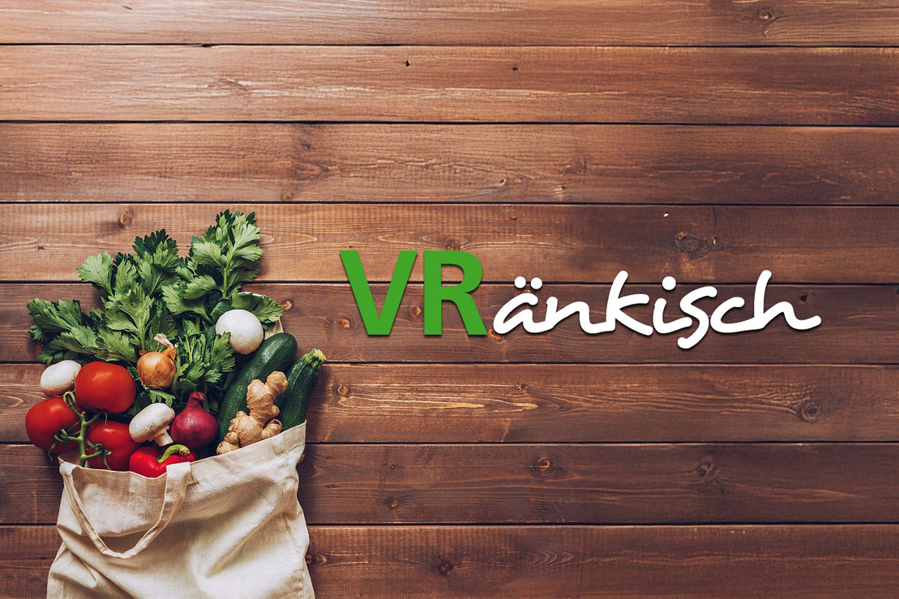 Stoffbeutel gefüllt mit verschiedenen Gemüsesorten und dem Slogan VRänkisch