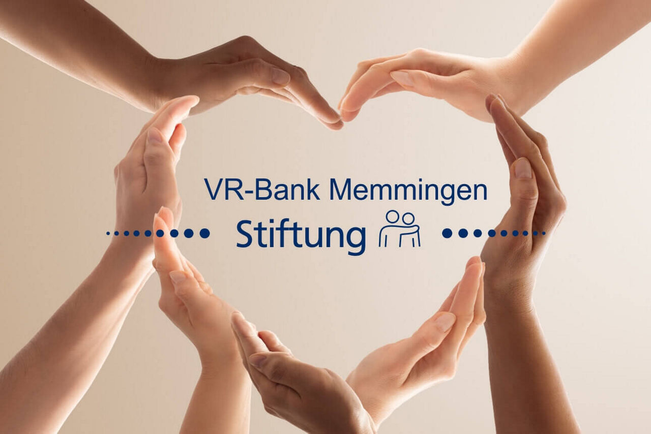 Hände bilden ein Herz mit Schrift VR-Bank Memmingen Stiftung