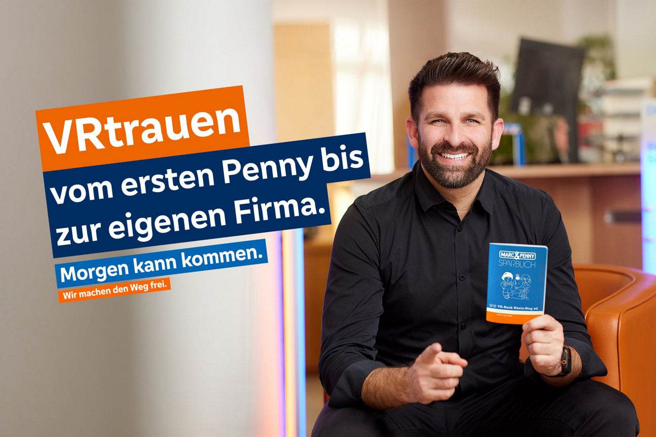 Hendrik Brock mit dem Schriftzug VRtrauen vom ersten Penny bis zur eigenen Firma