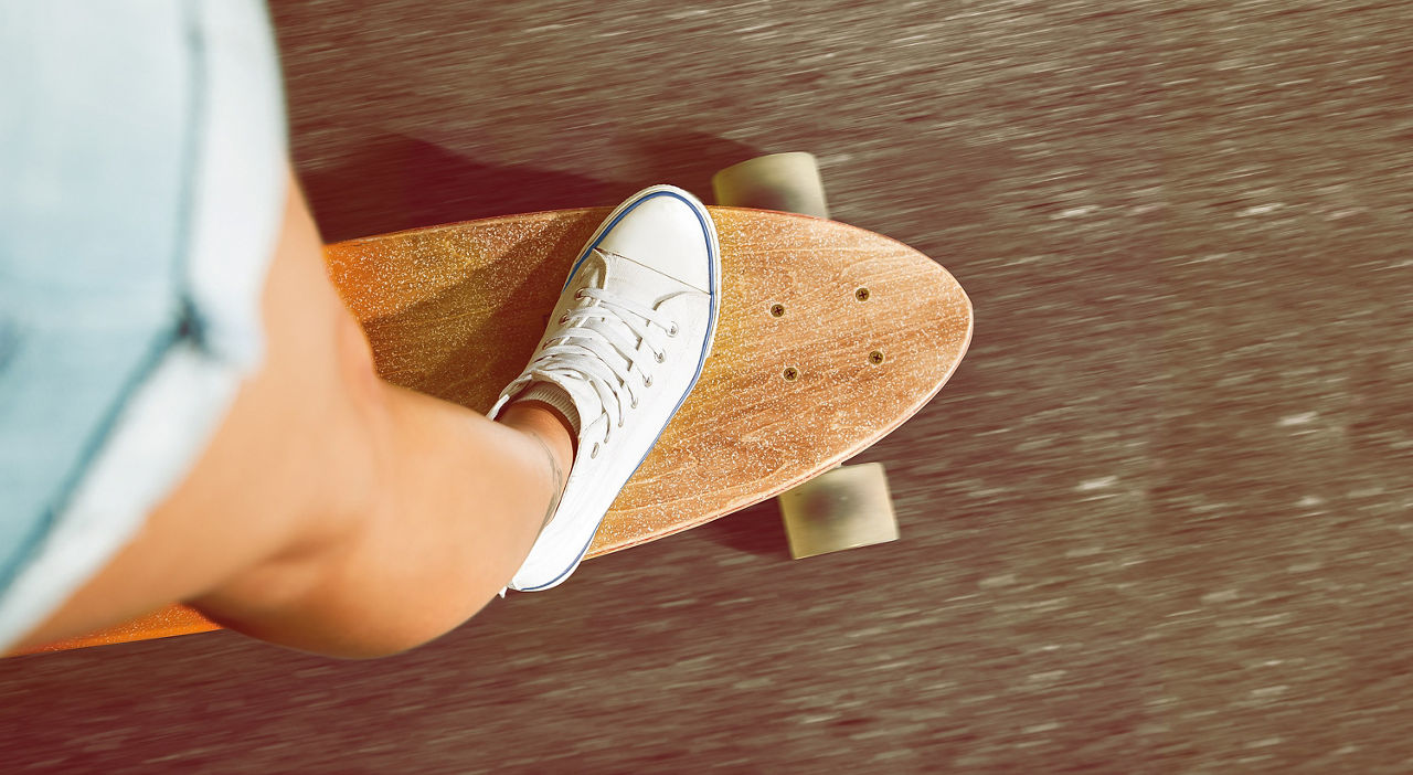 Fuß auf Skateboard