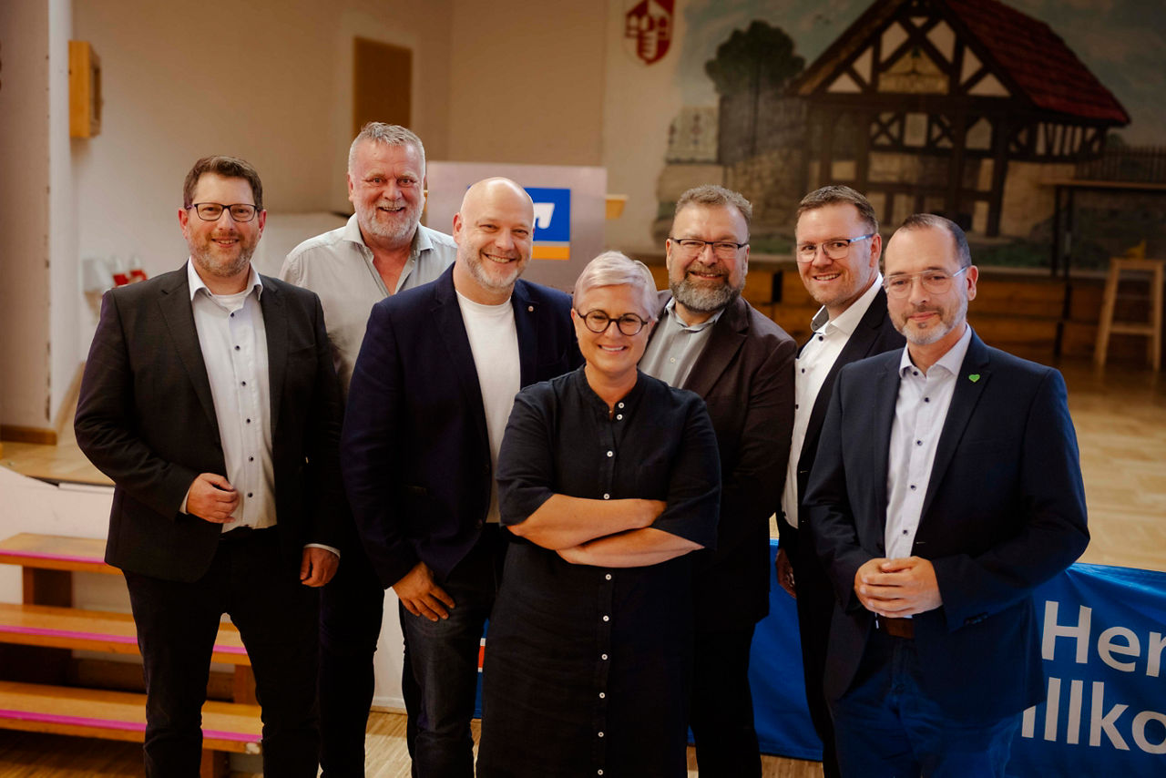 Angelika Götz mit Christian Klaus, Burhard Werner, Steffen Würstl, Andreas Bohlig, Hendrik Freund und Christian Seeber