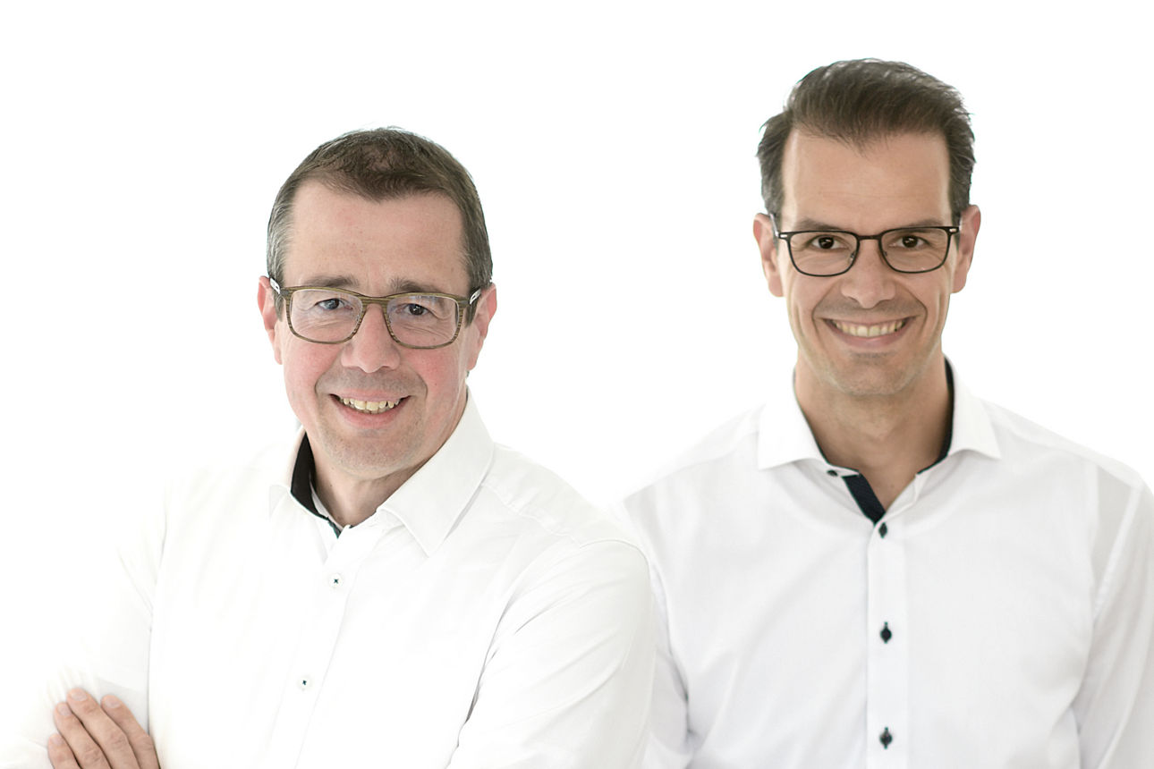 Vorstand der Volksbank Schermbeck 2 Männer stehend