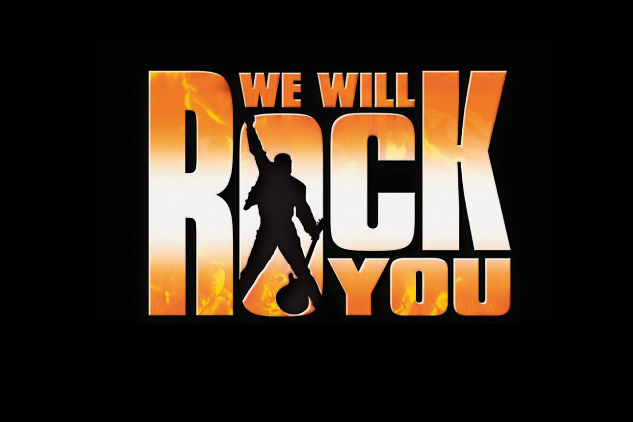 Schriftzug WE WILL ROCK YOU in orange weiß auf schwarzem Hintergrund
