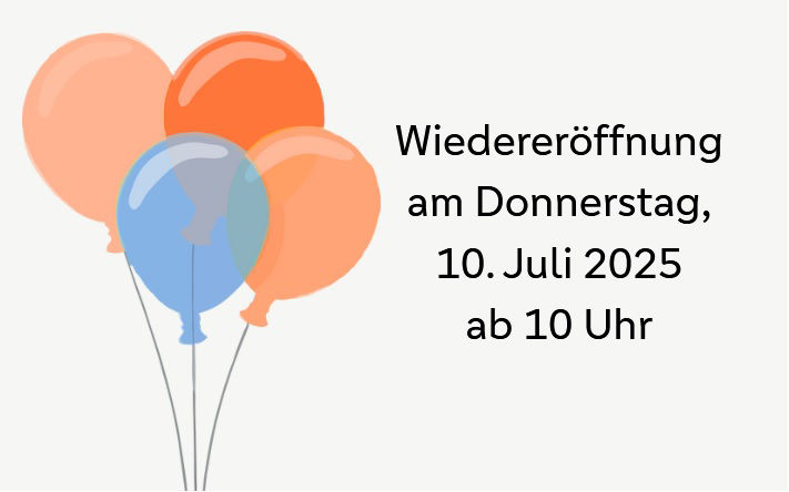 Luftballons mit dem Termin der Wiedereröffnung
