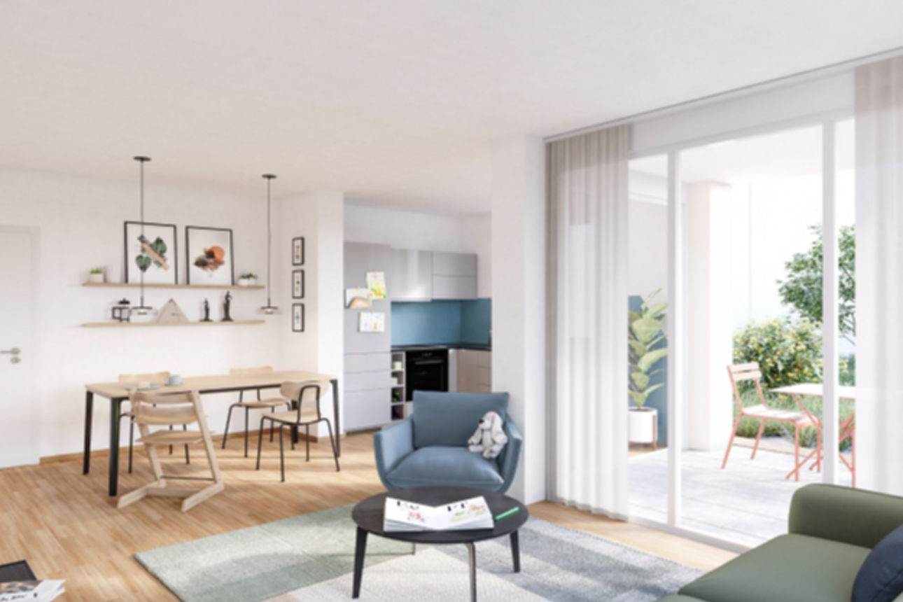 Offener Wohn- und Essbereich mit Sitzecke, Esstisch und moderner Küche.