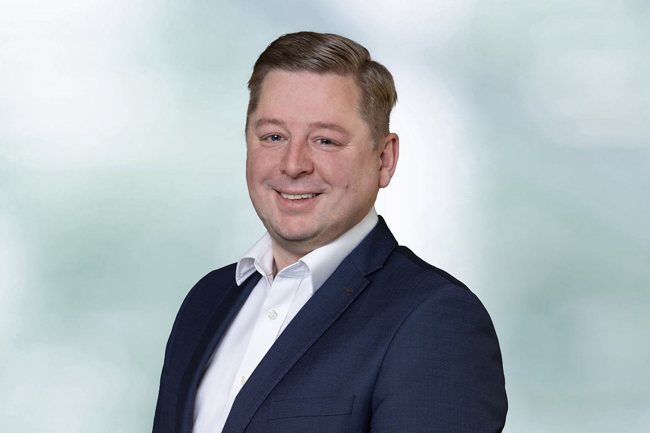 Portraitaufnahme unseres Kollegen Daniel Wolter