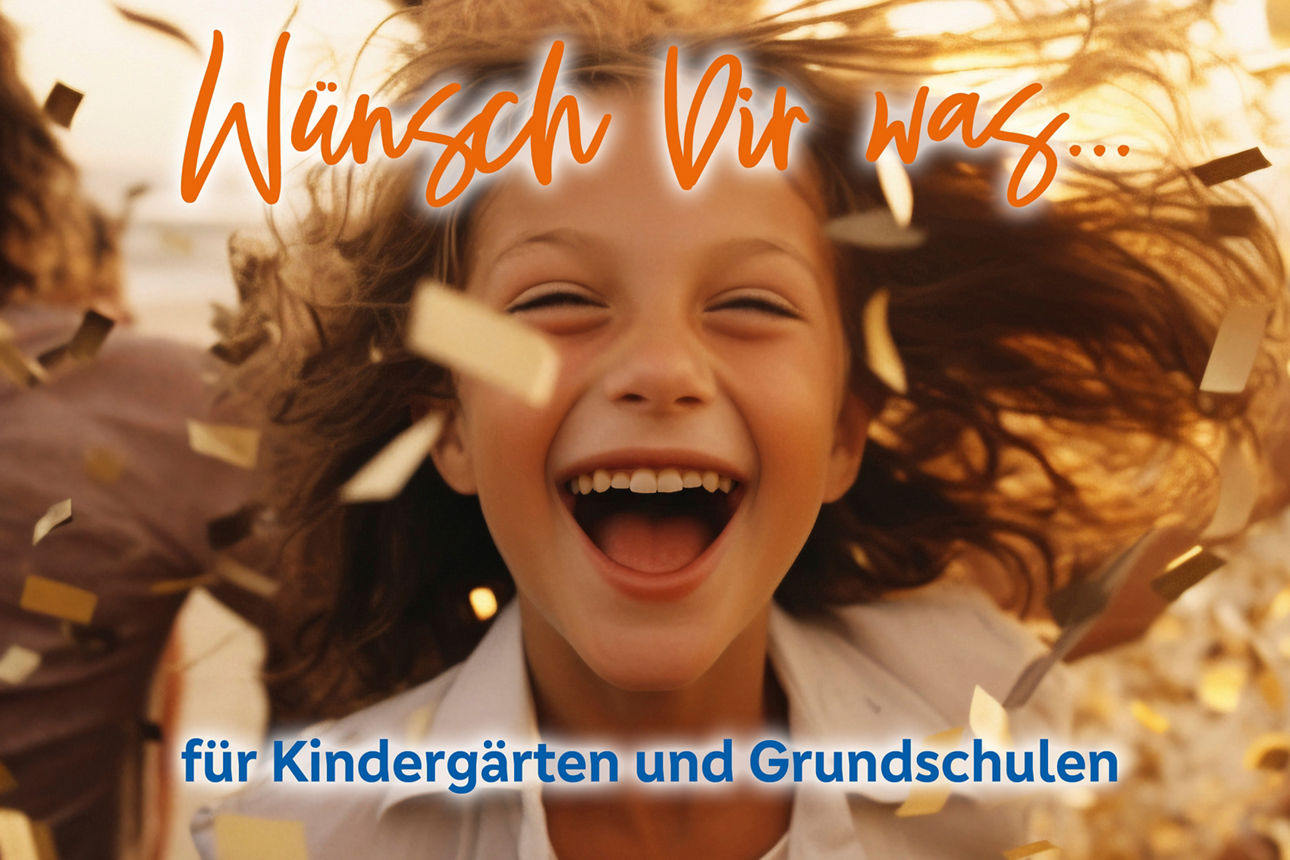 Auf ein lächelnde Frau fällt Konfetti. Der Schriftzug "Wünsch dir was für Kindergärten und Grundschulen" ist zu lesen.