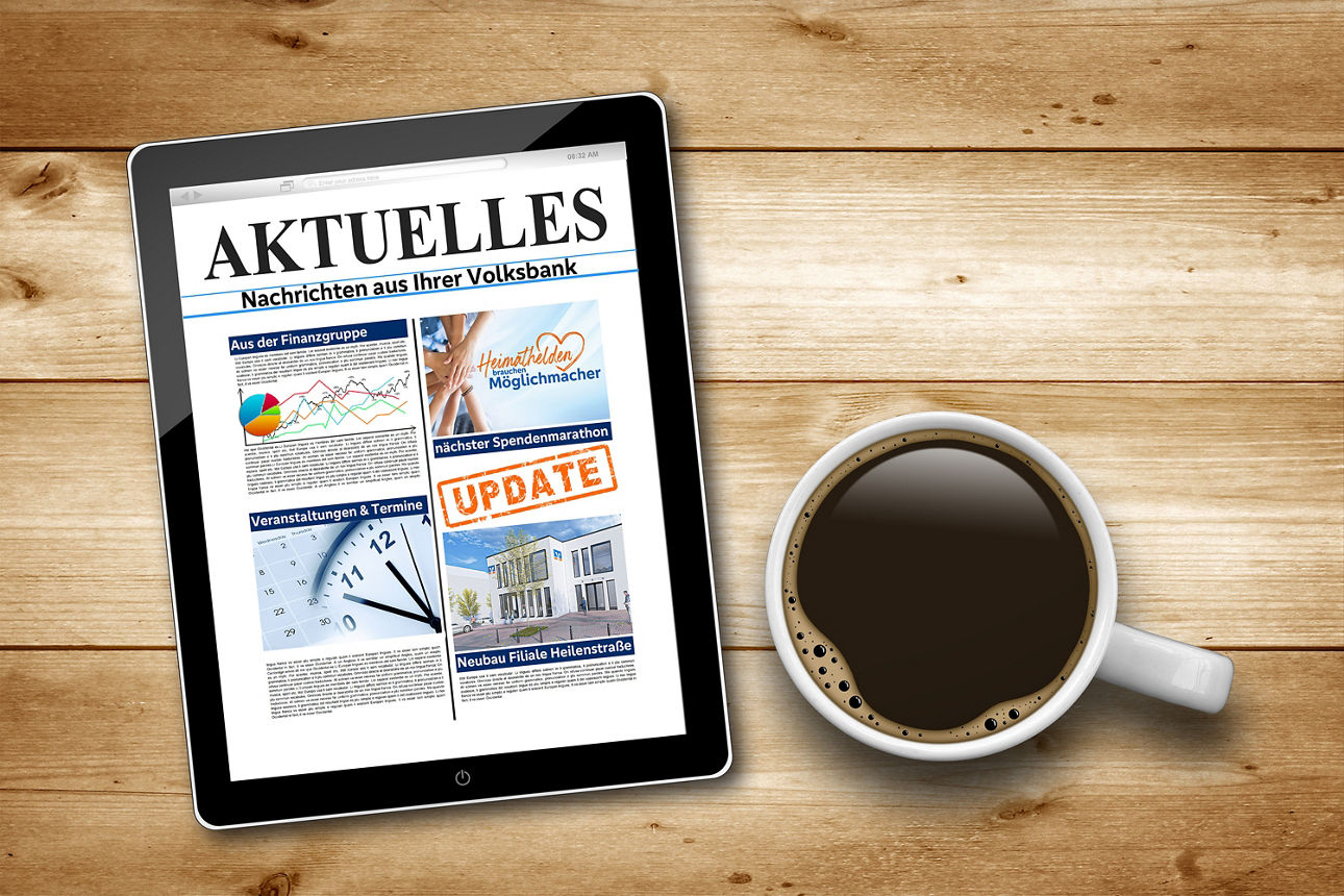 Ipad zeigt eine Zeitung mit aktuellen Informationen neben einer Kaffeetasse 