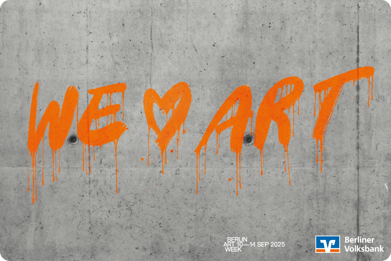 Ein an die Wand gesprühtes We love art