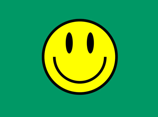 Smiley auf grünem Grund