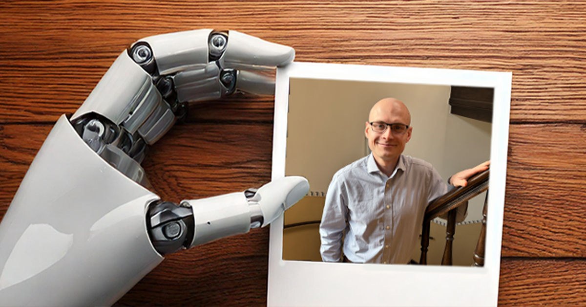 Smarte Systeme: Ein Foto von Jeremie Kreuseler mit einer Roboterhand