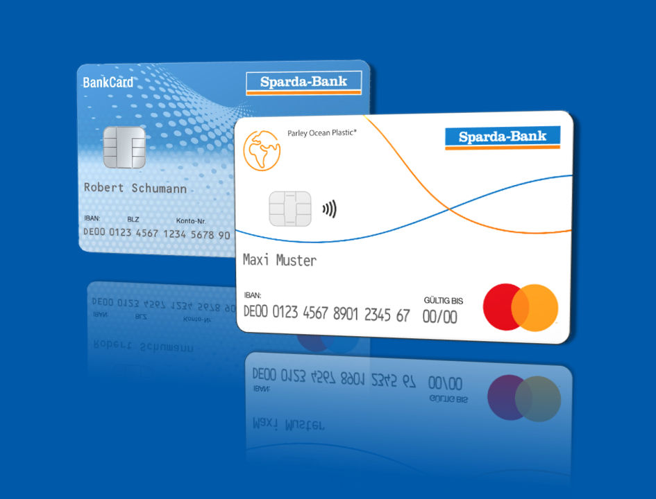 Vorderseite der blauen BankCard und der neuen weißen girocard (Debitkarte) mit einer Spiegelung