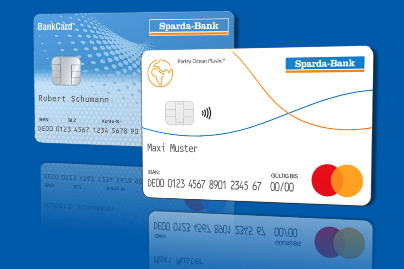 Vorderseite der blauen BankCard und der neuen weißen girocard (Debitkarte) mit einer Spiegelung