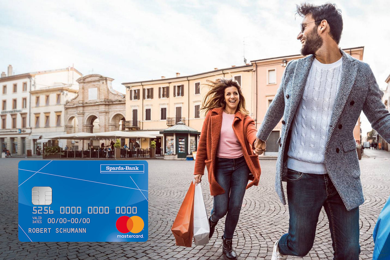 Mann und Frau beim Shopping mit Mastercard Classic