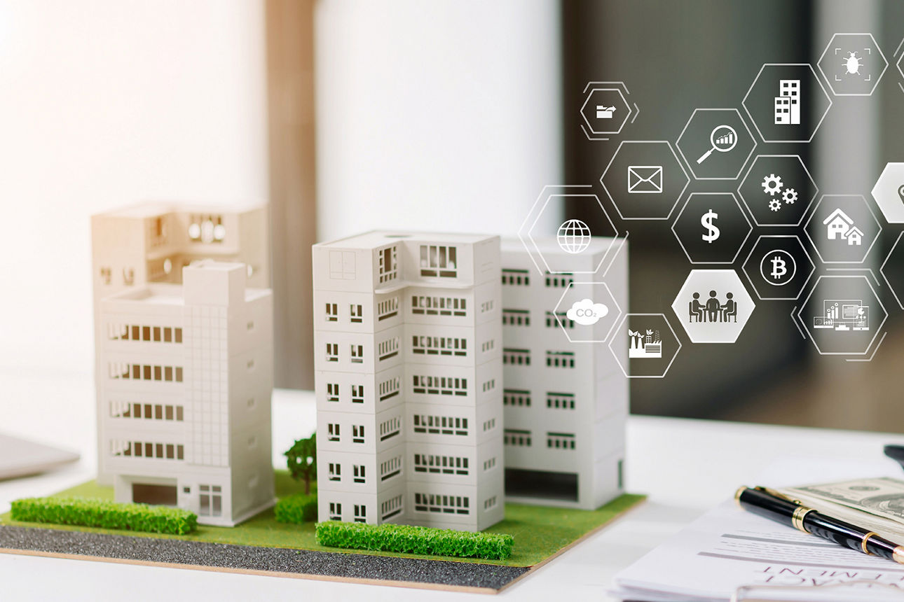 Zwei schöne Gebäude mit viel Grün drumherum