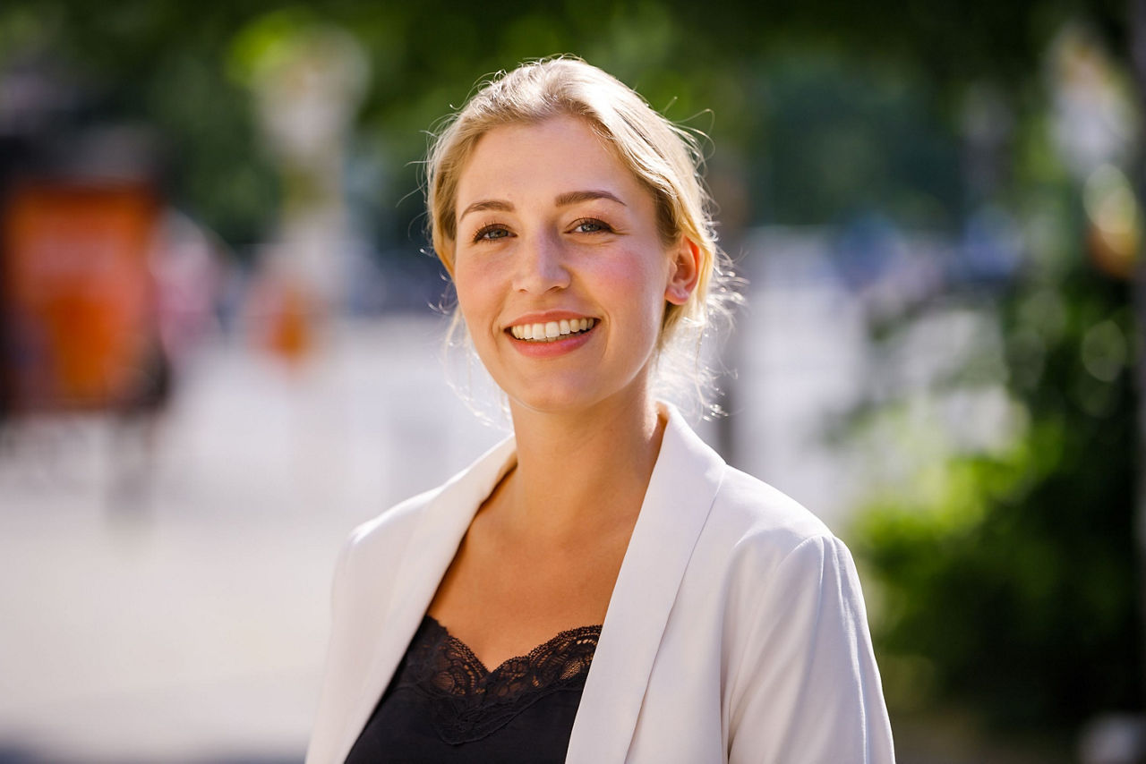Porträtaufnahme einer PSD Kundin