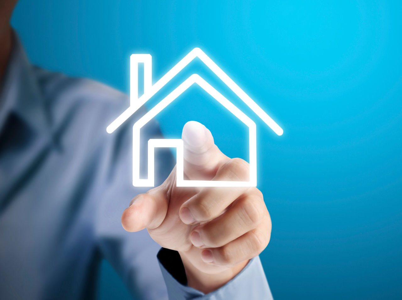 Hand pressing the house icon