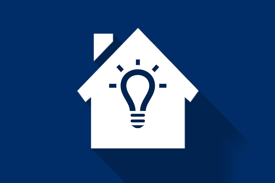 Immobilienratgeber - Abbildung eines Hauses mit einer Glühbirne in der Mitte