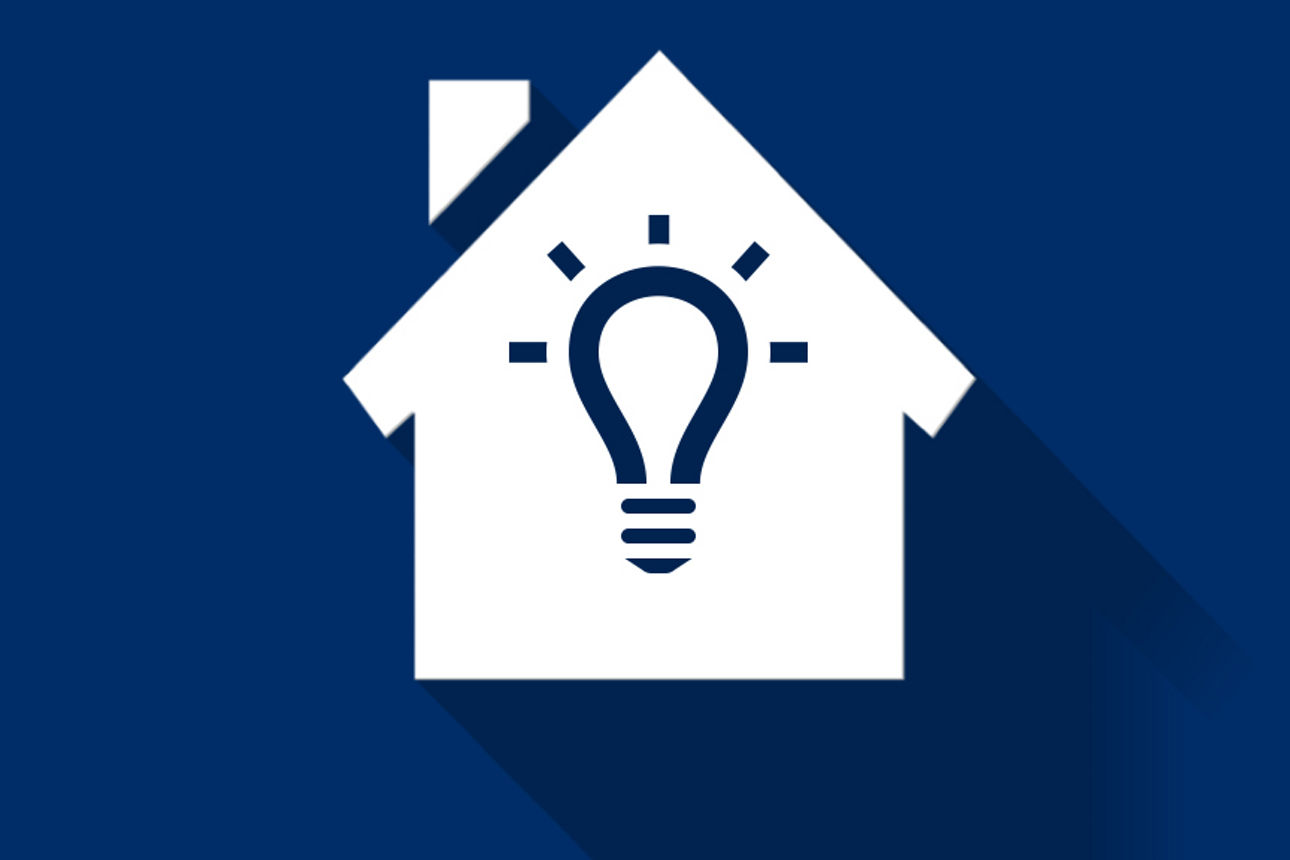 Immobilienratgeber - Abbildung eines Hauses mit einer Glühbirne in der Mitte