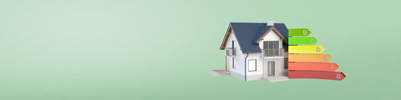 Haus auf grünem Hintergrund mit Energieeffizienz Kategorien