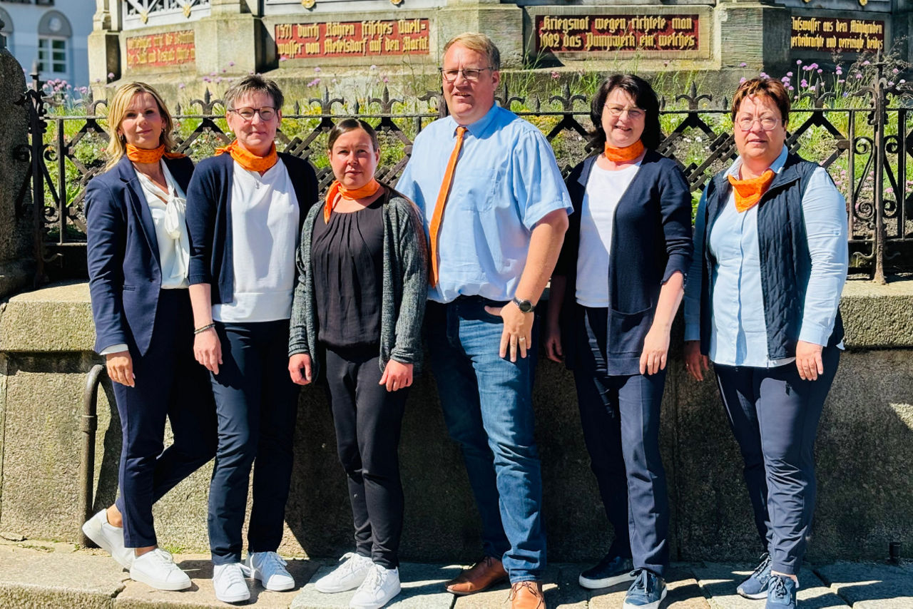 Gruppenbild von Mitarbeiterinnen und Mitarbeitern unseres KundenDialogCenters