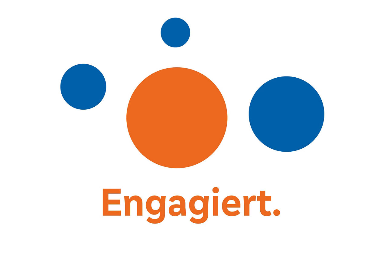 Eine lebendige Mischung aus Orange und Blau, die die Verbundenheit des Engagements symbolisiert.