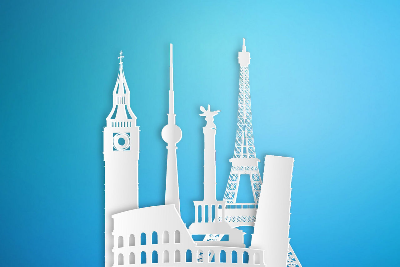 Weiße Zeichnung vom Eifelturm, Collosseum, schiefen Turm von Pisa, Fernsehturm Berlin und Big Ben vor blauem Hintergrund