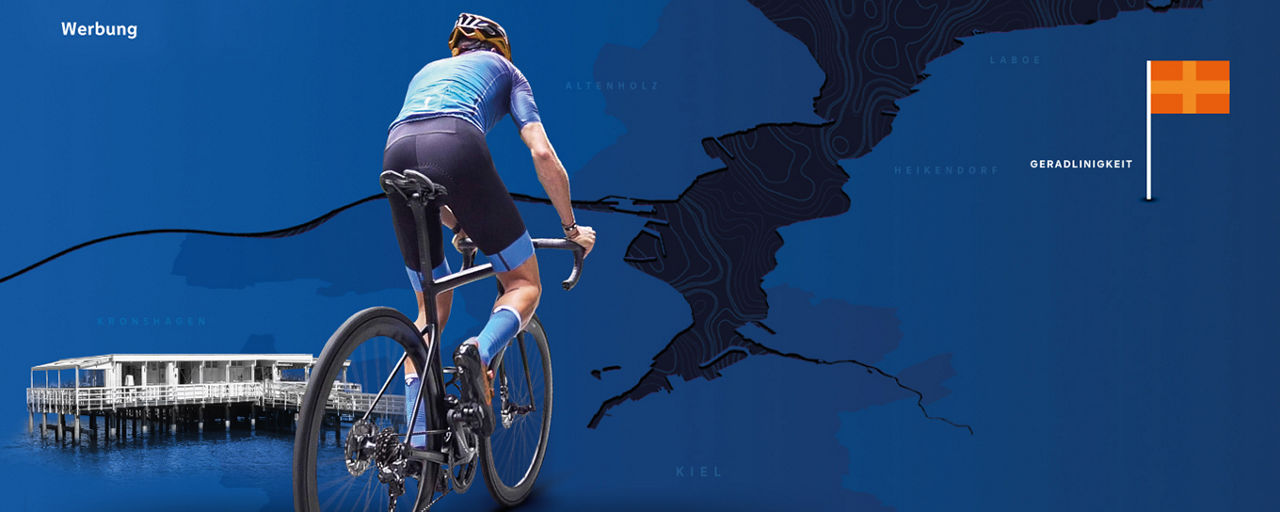 Fahrradfahrer auf einem Rennrad, blauer Hintergrund