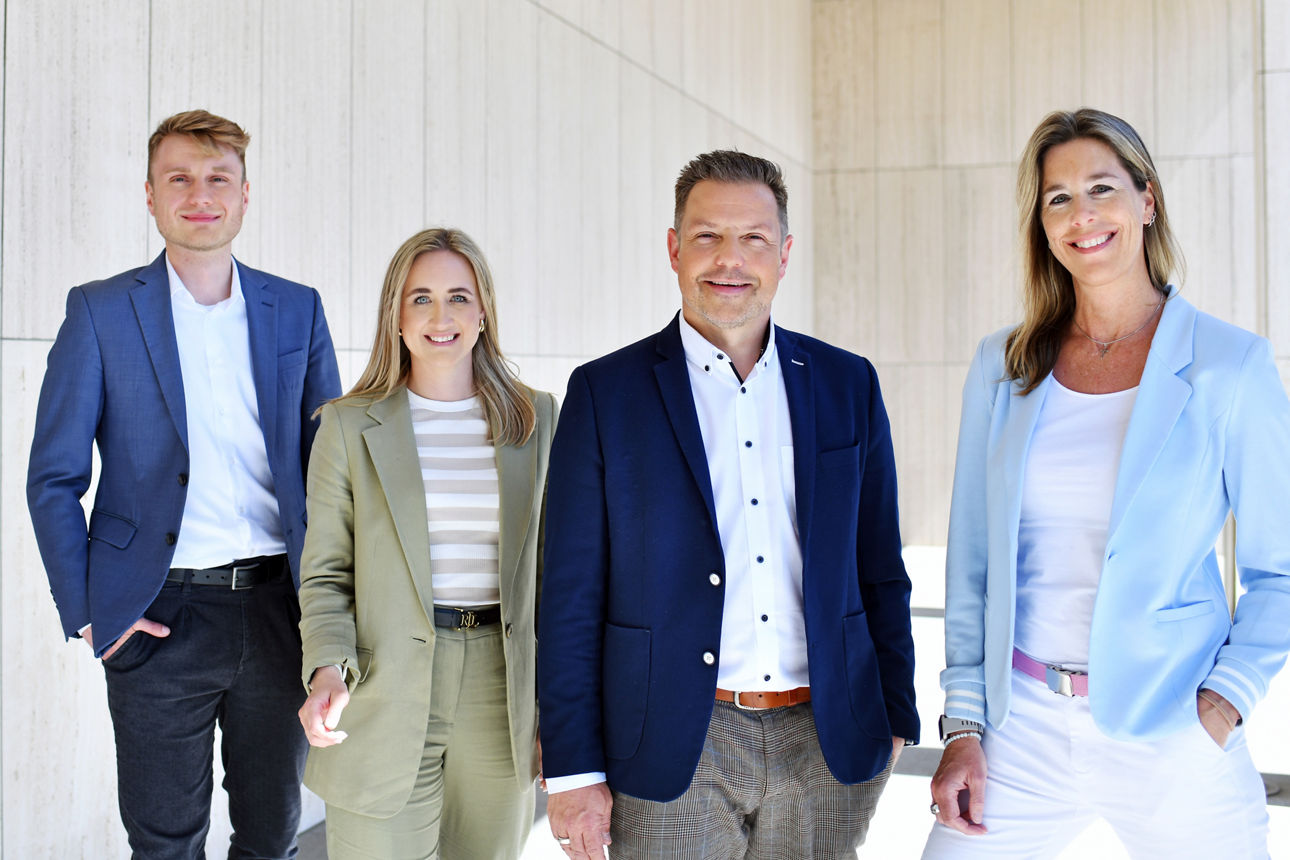 Vier Mitarbeiter der Kieler Volksbank